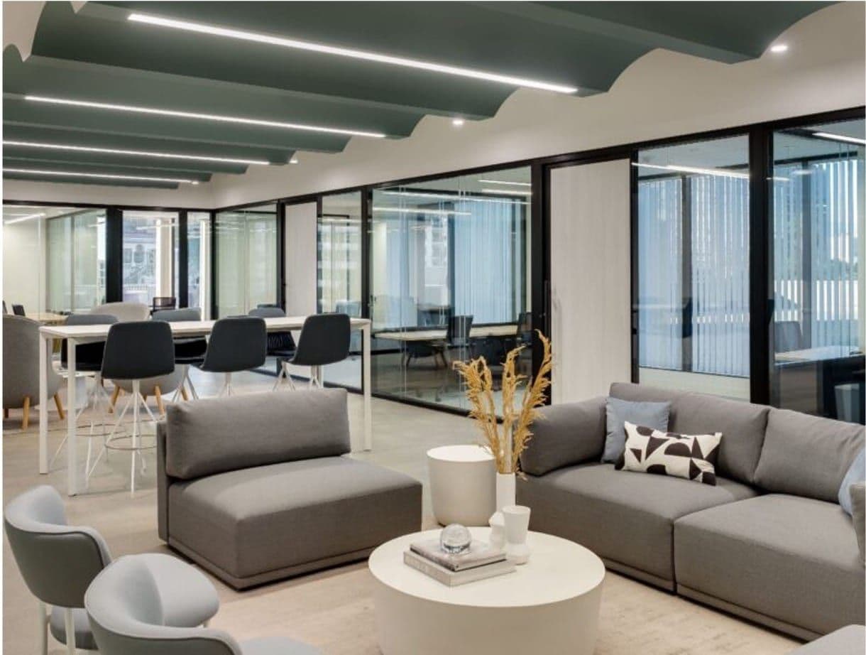 Open coworking floor with communal desks